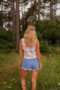 This Ecru and Pink Alisha Top features intricate crochet details, a slightly cropped fit, and charming pink and green floral patterns. Its lightweight fabric allows for a hint of transparency, adding a touch of allure to your look. Ophelie is also wearing the Blue Franck Denim shorts and the Pink Emma Cardigan One size (fits from US sizes 4-8) Length 16.9 in - Width 17.3 in 100% Cotton Washing: 86°F Summer Floral Print Lace Top, Fitted Floral Print Lace Top For Summer, Pink Crochet Top With Lace Trim For Spring, Casual Summer Crochet Top With Floral Embroidery, Casual Crochet Top With Floral Embroidery For Summer, Spring Floral Embroidery Crochet Top, Spring Pink Lace Crop Top, Pink Lace Crop Top For Spring, Feminine Summer Lace Top With Floral Embroidery