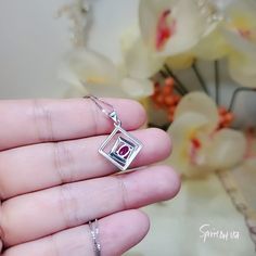 "Tiny square Red Ruby Gemstone Jewelry High Quality unique Artisan design full sterling silver made ◆◆Pendant Main stone:4*6mm created red ruby Pendant Height ( include bail) :22.5mm Pendant Holder (bezel & Bail) : 925 Sterling Silver Accent Stone: Sim Diamond ◆◆ Necklace chain : Platinum gold coated 925 sterling silver Box Chain with length option from 16\" ~20\". The model wearing the default size 18\". 16 inch ≈ 40cm 18 inch ≈ 45cm 20 inch ≈ 50cm ♥ Gemstone Reference Meaning Card included Rectangular Diamond Gemstone Necklace, Modern Red Ruby Jewelry, Red Gemstone Jewelry With Square Pendant, Red Gemstone Necklace With Square Pendant, Red Gemstone Square Pendant Necklaces, Red Gemstone Square Pendant Jewelry, Red Gemstone Square Pendant Necklace, Red Square Pendant Gemstone Jewelry, Red Square Cut Gemstone Jewelry