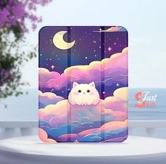 an ipad case with a white cat sitting on top of clouds and the ocean in the background