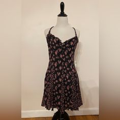 Free People Black Mini Dress With Pink Flowers. Size Medium. Nwt. Unlined Lace Up Front Top, Can Wear Open Or Tied Up. Swing Dress. Never Been Worn Nwr Black Fitted Mini Sundress, Black Fitted Knee-length Sundress, Black Floral Print Cotton Sundress, Black Cotton Sundress With Floral Print, Lace Up Front Top, Adele Dress, Free People Mini Dress, Combo Dress, Linen Mini Dress