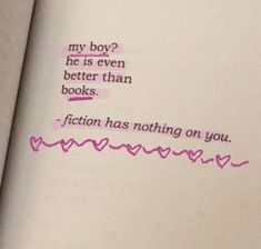 an open book with pink writing on the pages and a handwritten quote in it