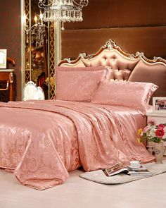 A luxurious bedroom with an ornate design features a king-sized bed adorned in the 19 Momme Jacquard Silk Bedding Set - 4Pcs from SusanSilk Jacquard Bedding, Silk Bedding Set, Best Sheets, Mulberry Silk Fabric, Silk Sheets, Silk Bedding, Light Coral, Jacquard Pattern, Beautiful Picture