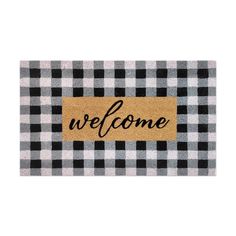 a welcome mat with black and white checkered pattern on the bottom that says'welcome '