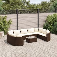 an outdoor furniture set on a brick patio