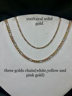 10K AND 14K SOLID TRI TONE GOLD FIGARO NECKLACE WITH DIAMOND CUTS, HEAVY NECKLACE FOR MEN'S AND WOMEN'S.MADE TO ORDER CUSTOM LENGTH. *10k and 14k solid gold jewelry*NO FILLED OR PLATED GOLD*100%REAL GOLD*NOT HALLOW* necklace weight approximately: 3mm (6-10 grams) 5mm (13-18 grams) *How to order: -select the WIDTH : 3mm 5mm -select necklace LENGTH:  14"inches to 24"inches(we can custom any size just sends us a message before placing your order) *Shipping:2-4 days *Made:1-5 days *Our products come Fine Jewelry With Figaro Chain Link, 14k Gold Oval Link Necklace With Diamond Cut, 14k Gold Figaro Chain Fine Jewelry, Fine Jewelry White Gold Figaro Chain, Anniversary Jewelry With Figaro Chain Link, Yellow Gold Figaro Chain Necklace For Anniversary, White Gold Oval Link Jewelry With Figaro Chain, Fine Jewelry White Gold Figaro Chain Necklace, Fine Jewelry White Gold Necklace With Figaro Chain