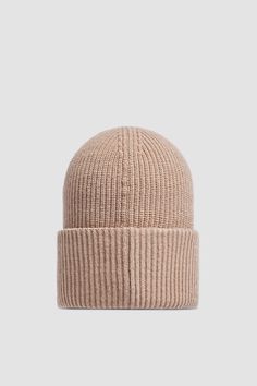 Designed for warmth and comfort, this knit beanie is crafted from responsibly sourced carded wool. The mid-weight accessory has a classic ribbed knit finish. Cashmere Soft Knit Beanie, Cozy Cashmere Beanie Hat, Winter Cashmere Knitted Hat, Winter Knitted Cashmere Hat, Knitted Cashmere Beanie Hat, Casual Cashmere Beanie For Cold Weather, Classic Beige Beanie For Winter, Classic Knitted Beanie For Everyday, Classic Knitted Everyday Beanie