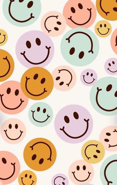 many different colored smiley faces on a white background with brown, pink, and blue circles