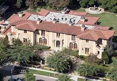 an aerial view of a large mansion