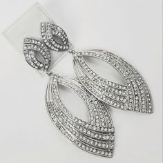 White Crystal Fashion Earrings White/Silver They Look Beautiful At Night Parties, High Quality. Condition: New Without Tag. Measures" 3"L X 1½"W White Sterling Silver Chandelier Earrings For Party, Glamorous White Crystal Metal Earrings, Glamorous White Metal Chandelier Earrings, White Crystal Metal Earrings For Formal Events, White Metal Crystal Earrings For Formal Occasions, White Sterling Silver Chandelier Earrings For Evening, Light Blue Gemstone, Betsey Johnson Earrings, Crystal Fashion