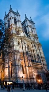 the large cathedral is lit up at night