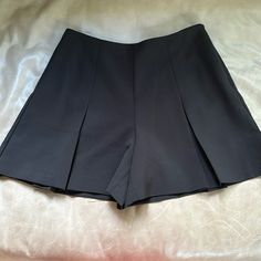 Milly Skort Sz 4 Perfect Condition Black Millie Skirt Super Cute. Perfect Condition Literally Never Worn, But I Took The Tags Off. Look At My Other Listings To Bundle And Save. Pleated Shorts For Night Out, Short Pleated Bottoms For Night Out, Elegant Black Wide Leg Shorts, Elegant Wide-leg Black Shorts, Elegant Pleated Short Bottoms, Short Pleated Party Bottoms, Chic Pleated Short Leg Bottoms, Black Pleated Short Bottoms, Black Pleated Short-length Bottoms