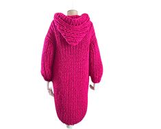 🌟 **Handmade Carefully crafted with special attention. 🧶 **Woolen and Thick Made with 3-ply wool yarn for warmth and softness. 👘 **Long and Loose Boho style for a chic and comfortable look. 🌨️ **Winter-Ready Keeps you cozy on cold winter days. 🎨 **Color Options Reflect your style with a variety of beautiful colors. 🧥 **Hooded Stand out with a practical and stylish hood. Each order is custom-made just for you! 🎁 Cardigan length 46 inches  Fast shipping all over the world!! United Kingdom, Pink Chunky Knit Outerwear For Winter, Handmade Wool Sweater Coat For Winter, Cozy Handmade Fall Outerwear, Hand Knitted Winter Outerwear In One Size, Pink Hand Knitted Outerwear For Fall, Handmade One Size Winter Sweater Coat, Handmade One Size Sweater Coat For Winter, Handmade Long Sleeve Sweater Coat For Winter, Cozy Hand Knitted Outerwear For Cold Weather