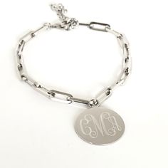 "Thick Monogram Paper Clip Chain Bracelet Sterling Silver or Gold Plated Monogrammed Stylish Just in the trendy our thick paper clip chain goes great with our monogram pendants. This sterling silver necklace or gold plated over sterling makes a beautiful present for your wife, mother or friend (or for yourself!). They are also perfect for for bridesmaids presents. I will engrave a monogram, single initial or name onto the round pendant. Comes in gift box. Pendant - Sterling Silver or Gold Filled Trendy Silver Paperclip Bracelet With Oval Links, Silver Monogram Jewelry For Everyday, Everyday Silver Monogram Jewelry, Trendy Personalized Paperclip Jewelry, Modern Metal Chain Bracelet Personalized, Personalized Minimalist Chain Link Jewelry, Personalized Silver Link Chain Bracelet, Personalized Silver Chain Bracelet For Everyday, Modern Silver Paperclip Bracelet As Gift