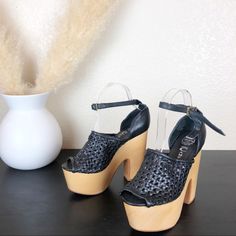 Size 8.5 Medium. In Like New Condition. Unique Pair Of Platforms. Black Woven Leather Upper. Wooden Block Platform Heels. Ankle Buckles With Antique Buckle Closure. Curve Wedges Heel. 5.5” Heel. 2.5” Platform. Seen On Tv. Smoke Free Home. Reasonable Offers Welcome! Chic Woven Leather Heels With Round Toe, Closed Toe Woven Leather Heels, Woven Leather Closed Toe Heels, Woven Leather Heels With Round Toe, Black High Heel Wedge Sandals With Leather Sole, Black Woven Leather Sandals With Ankle Strap, Black Ankle Strap Sandals With Woven Leather, Synthetic Open Toe Heels With Woven Leather, Black Round Toe Heels With Woven Leather