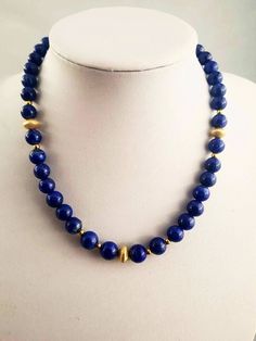 genuine Lapis lazuli beaded necklace / lapis necklace / quality lapis necklace / lapis jewelry / gift idea for her This is a fantastic high  quality lapis lazuli not treated elegantly design to sit on your collar bone for a formal dinner night or with a cocktail dress. Super statement piece, really don't need anything else when you are adorned with this piece.  it can be customized to gold fill or solid gold clasp and beads Material: * Lapis beads * Gold plated beads on silver * Gold plated clasp for more  option please message me in the note to seller Chip Bead Necklace, Lapis Jewelry, Dinner Night, Lapis Necklace, Beautiful Gold Necklaces, Lapis Lazuli Necklace, Lapis Lazuli Beads, Collar Bone, Crystal Headband