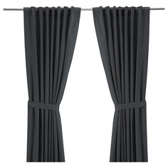 two black curtains hanging on a metal rod, with one curtain pulled open and the other closed