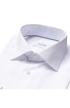 Modern French cuffs add elegance to a spread-collar dress shirt richly woven from pure cotton. Since 1928, Eton has been making men’s shirts that meet the highest expectations of quality, fusing Scandinavian sensibilities and the rich traditions of English textiles. They make a shirt that is well worth wearing, and because they take ownership of the production process from day one, the quality never wavers. Permanent collar stays. French placket. Curved hem. Back yoke. 100% cotton. Machine wash Luxury Cotton Dress Shirt For Office, Luxury Business Casual Shirt, Timeless Business Shirt, Luxury Cotton Dress Shirt For Semi-formal Occasions, Luxury Formal Cotton Shirt, Luxury Cotton Formal Shirt, Luxury Semi-formal Collared Dress Shirt, Luxury Dress Shirt With Button Cuffs And Spread Collar, Luxury Dress Shirt With Spread Collar And Button Cuffs