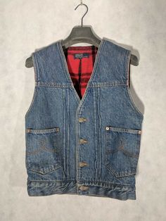 Rare piece, great vintage condition. Pit to pit: 19" Length: 22 1/1" Arm opening: 9 3/4" Dark Wash Denim Top For Winter, Winter Dark Wash Denim Top With Pockets, Winter Dark Wash Denim Top, Winter Denim Top With Pockets, Casual Winter Denim Vest, Plaid Denim Outerwear With Pockets, Vintage Medium Wash Denim Top For Fall, Retro Denim Vest With Pockets For Fall, Dark Wash Denim Vest With Pockets For Fall