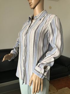 Button up women's vintage shirt. Striped crinkle fabric blouse.   PRODUCT DETAILS - Brand: Next  - Size: Based on the measurements below this would best fit a size M (10). Please view measurements in the photos! - Color: Lilac, blue, white and brown stripes                        - Fastening: buttons - Condition: Excellent vintage condition   MEASUREMENTS (laying flat). Please view the photos! - Length - 24 3/4" (63 cm) - Pit to pit - 19 2/3" (50 cm) - Shoulder to shoulder: 15" (38 cm) - Sleeve Casual Crinkle Texture Shirt For Spring, Casual Button-up Top With Crinkle Texture, Casual Crinkle Texture Button-up Tops, Summer Long Sleeve Crinkle Texture Blouse, Summer Long Sleeve Blouse With Crinkle Texture, Long Sleeve Blouse With Crinkle Texture For Summer, Casual Long Sleeve Tops With Crinkle Texture, Long Sleeve Linen Office Tops, Long Sleeve Linen Tops For Office