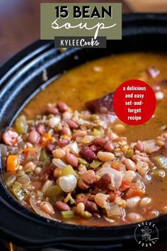 a bowl filled with beans and vegetables on top of a table