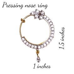 Add a touch of elegance to your look with our Cz Delicate Nose Ring. Made with Rhodium Plating and adorned with sparkling cz stones, this traditional ethnic jewelry piece is perfect for weddings and special occasions. A must-have for any sophisticated woman. Piercing is required for a perfect fit. Each pack contains 1 NathMATERIAL - Alloy Metal with Rhodium PlatingDIMENSIONS - 1.5 Inch Tall, 1 Inch WideSKIN FRIENDLY - This product does not contain any harmful constituents. Anti-allergic and Safe Woman Piercing, Pressing Nose Ring, Nose Ring Jewelry, Diamond Nose Ring, Indian Nose Ring, Fake Nose Rings, Water Perfume, Fake Nose, Nose Pin