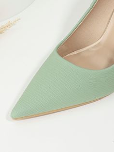 Introducing our Mint Green Floral Print Point Toe Pumps. Elevate your style with these fashionable high heel shoes for women. Featuring a delicate and charming floral print, these pumps are perfect for adding a touch of elegance to any outfit. The pointed toe design adds a sophisticated touch, while the high heel provides both style and height. Color : Mint Green Type : Court Pumps Style : Fashionable Toe : Point Toe Pattern Type : Floral Heels : Pyramid Heel Height : High Heel Upper Material : PU Leather Lining Material : PU Leather Size US Ball Girth Foot Length Heel Height EUR36 US6 8.2 9 3.5 EUR37 US6.5 8.4 9.3 3.5 EUR38 US7 8.6 9.5 3.5 EUR39 US8 8.8 9.7 3.5 EUR40 US9 8.9 10 3.5 EUR41 US9.5 9.1 10.2 3.5 EUR42 US10.5 9.3 10.4 3.5 Green Summer Office Heels, Summer Court Shoes With 4-inch Heel For Office, Summer High Heel Court Shoes In Synthetic, High Heel Synthetic Court Shoes For Summer, Trendy Spring Court Shoes With Closed Toe, Green Flat Heels For Spring, Chic Synthetic Court Shoes For Summer, Feminine Ankle Strap Court Shoes For Spring, Feminine Closed Toe Court Shoes For Spring