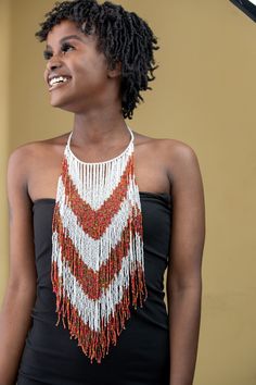 Unique African Maasai Handcrafted Beaded Necklace with an Elegant Look and Brilliant Finish. Color = White, and Multi-Color. Length (Around Neck) = 17 Inches/ 44 Centimeters. Length ( Downwards ) = 15 Inches / 39 Centimeters. **GET FREE SHIPPING FOR ADDITIONAL ITEMS PURCHASED. Yes, Buy Multiple Items and pay shipping for 1 item only- The rest ships Free. (No Limits on the number of Multiple items). With a faster delivery time of 3 days via DHLExpress, Worldwide. Ordinary/Standard Shipping also a White Necklace For Festivals, White Unique Long Beaded Necklace, Unique White Long Beaded Necklace, White Artisan Beaded Necklaces With Beaded Chain, Artisan Necklace With Colorful Beads, White Artisan Beaded Necklace With Beaded Chain, Artisan White Beaded Chain Necklace, Artisan White Beads For Festival, White Multi-strand Necklace For Festival