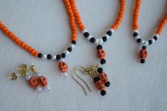 These fun and unique necklaces, earrings or sets make a great addition to any Halloween costume. They are very nice and well made so you can wear them out or to the office to show that you are in the Halloween spirit. This jewelry set will also make a wonderful gift or party favor for Halloween. The necklaces are made with stretchy beading cord so it will give you some flexibility in fit. I can also add a chain extension if you need more length. They are finished with a lobster claw clasp to mak Unique Halloween Party Jewelry, Novelty Jewelry For Halloween Costume, Handmade Jewelry For Halloween Party, Novelty Halloween Costume Jewelry, Handmade Halloween Party Jewelry, Handmade Costume Jewelry For Halloween, Handmade Dangle Necklaces For Halloween, Handmade Dangle Halloween Jewelry, Handmade Dangle Jewelry For Halloween