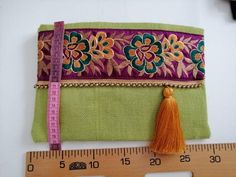 Festive Embroidered Rectangular Pouch, Festive Handmade Multicolor Pouch, Handheld Evening Bag For Festivals, Festive Handheld Handmade Clutch, Handmade Pouch Clutch, Handmade Purple Bags For Gifts, Handmade Green Bag For Gift, Handmade Purple Bags As Gifts, Handmade Clutch Pouch For Daily Use