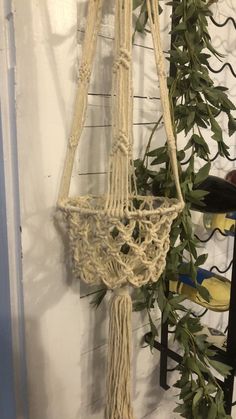 there is a macrame hanging from the wall