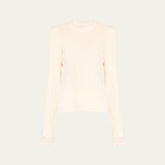 3.1 Phillip Lim pointelle knit top featuring ruffle trim  Crew neckline Long sleeves Boxy fit Hem falls to the hip Pullover style  Tencel® lyocell/polyester/cotton Dry clean Imported Spring Feminine Fine Knit Sweater, Spring Fine Knit Feminine Sweater, Feminine Fine Knit Sweater, Feminine Pointelle Knit Sweater, Elegant Pointelle Knit Top For Work, Crew Neck Ruffle Sweater For Layering, Ruffled Crew Neck Knit Top, Crew Neck Knit Top With Ruffles, Fine Knit Top For Spring Workwear