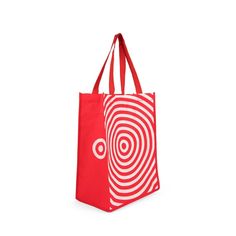 Enhance your shopping trips with the Target Reusable Bag Bullseye Tote, your stylish companion for running everyday errands. This reusable tote is designed to withstand daily use while helping to reduce single-use waste. It offers ample space for groceries, books, essentials and other items. Featuring an open main compartment and no interior or exterior pockets, the Target reusable bag Bullseye tote provides simplicity and utility for your needs. Cute Target Bags, Target Tote Bag, Red Tote Baguette Bag For Shopping, Affordable Urban Outfitters Tote Bags, Cute Reusable Grocery Bags, Red Reusable Shopping Bag, Target Bag, Target Grocery, Target Shopping