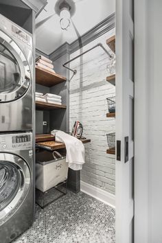 a washer and dryer in a small room