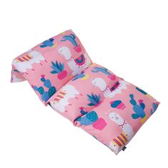 a pink pillow with llamas and cactuses on it, sitting next to each other