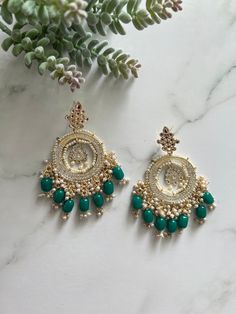 Baali chandbali earrings Stylish designer earrings Kundan, faux pearl and beads detailing Swipe through for colour selection 9cm in length Handcrafted in India Any questions please feel free to ask Green Kundan Chandbalis For Reception, Festive Stone Work Chandelier Earrings For Reception, Chandbali Meenakari Danglers For Reception, Meenakari Chandbali Danglers For Reception, Festive Chandelier Earrings With Stone Work For Reception, Bollywood Green Bridal Earrings For Reception, Green Chandbalis For Reception And Festivals, Reception Chandbali Chandelier Earrings In Kundan, Traditional Beaded Chandbalis For Festive Occasions