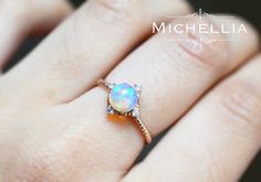 14/18K Aurora Opal Ring Gold Ethiopian Fire by MichelliaDesigns Celestial 14k Gold Opal Wedding Ring, Celestial Style Opal Ring With Halo For Anniversary, Celestial Opal Ring With Halo For Anniversary, Celestial Halo Opal Ring For Anniversary, Celestial Halo Design Wedding Jewelry, Celestial Halo Jewelry For Wedding, Celestial Halo Wedding Jewelry, Celestial Opal Ring For Anniversary, Celestial Style Opal Ring