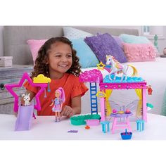 This Barbie A Touch of Magic playset features a Chelsea doll and baby pegasus with a color change mane! The magical set offers multiple play areas like a stable and slide, as well as a pet bunny and colorful accessories. Kids can play out their favorite scenes from the show, or come up with sweet stories on their own! Doll cannot stand alone. Colors and decorations may vary. Pig Family, Little Live Pets, Chelsea Doll, Barbie Doll Accessories, Barbie Outfits, Pet Bunny, Baby Pigs, Rainbow Theme, Colorful Accessories