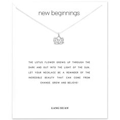 a necklace with the words new beginnings written on it and a lotus charm in silver