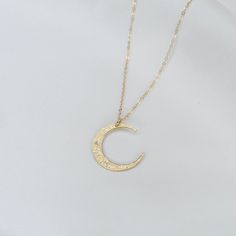 14K solid gold moon necklace - Hammered moon necklace 14K solid gold moon charm is 22 gauge, it is 20mm. 14K gold 1.2mm flat cable chain All components are 14k gold Please read our policies before you place your order. https://www.etsy.com/shop/SashJewelry/policy?ref=shopinfo_policies_leftnav To see other Mother daughter set click here: https://www.etsy.com/shop/SashJewelry?section_id=12441134&ref=shopsection_leftnav_1 To see more Girl's jewelry click on the link below http://www.etsy.com/sh Minimalist Gold-plated Necklace With Moon Charm, Moon-shaped Yellow Gold Necklaces With Charms, 14k Gold-filled Yellow Gold Necklace With Moon Charm, Yellow Gold Moon-shaped Necklaces With Charms, Gold Moon-shaped Necklace With Moon Charm, Other Mother, Gold Heart Bracelet, Gold Moon Necklace, Gold Moon