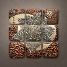 a set of six brown and white coasters with intricate designs on the front, back and sides