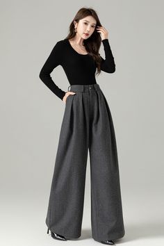 "DETAILS: * 50% wool, 50% polyester fiber * Polyester Lining * Two side pockets * Front zipper closure * Pleated detail * High waisted pants * Wide leg pants * Perfect for Winter, autumn * Dry clean *The model is 170cm (5' 7\") tall with 85 cm(33.4\") bust and 67 cm(26.7\")waist. She is wearing the dark gray wool pants in size XS. CUSTOM MADE SERVICE If you * Change other color * Can't find your size in our size Chart * Change the Style * Change the length * Your Height is not Between 5'1\" - 5\"9\" * Your weight is not Between 47 kg - 75kg I can do it for you, It will need some extra fee depending on on your need. Contact with me for more detail. SIZE GUIDE Size vary between Brand and Country Please get your body measurement with our Size Guide And Find your size in our Size Chart SIZE CH Palazzo Pants Winter, Palazzo Pants Outfit, Custom Pants, Pants Custom, Winter Trousers, Culotte Pants, Wool Clothing, Black Long Sleeve Top, Pantalon Large