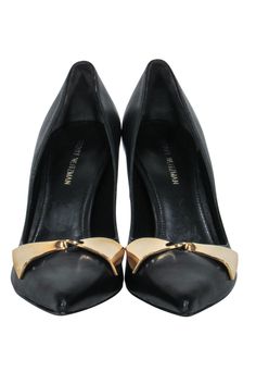 Step into a world of contemporary refinement with these chic Stuart Weitzman pumps, featuring a delightful gold bow accent on the upper, and pointed-toes. Pair these exquisite heels with a figure-hugging midi dress and a blazer for a chic and polished work look. Size 4.5 100% Leather Leather soles & insoles Gold metal bow on upper Lightly padded insole Pointed toe Heel height 3.5” Classic Evening Heels With Bow, Designer Heels With Gold-tone Hardware And Pointed Toe, Elegant Pointed Toe Court Shoes With Bow, Classic Formal Heels With Bow, Classic Pointed Toe Heels With Gold-tone Hardware, Leather Heels With Gold-tone Hardware And Pointed Toe, Classic Heels With Gold-tone Hardware And Pointed Toe, Formal Heels With Gold-tone Hardware, Classic Formal Heels With Metal Feet