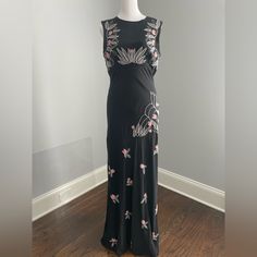 Long Black Size 8 Dress In Prestige Condition Worn Twice Has Unique Detail All Over , Design With Beads And Thread. No Sign Of Wear Sleeveless Floral Embroidered Maxi Dress For Evening, Sleeveless Maxi Dress With Floral Embroidery For Evening, Fitted Sleeveless Embellished Maxi Dress, Fitted Black Embellished Maxi Dress, Spring Embellished Black Maxi Dress, Sleeveless Embroidered Maxi Dress For Evening, Black Embellished Maxi Dress For Cocktail, Black Maxi Dress With Floral Embroidery For Evening, Black Floral Embroidery Maxi Dress For Evening