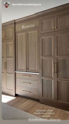 an empty kitchen with wooden cabinets and drawers