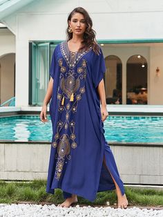 Unleash your inner boho goddess with our Sunset Serenity Maxi Bliss Dress! This stunning kaftan dress features intricate embroidery and a loose fit, perfect for all-day comfort and effortless style. Channel your free-spirited vibes and turn heads wherever you go this summer. Fabric Type: Viscose Decoration: Embroidery Bohemian Dresses For Eid Vacation, Bohemian Tassel Dress For Eid, Long Blue Boho Dress, Blue Embroidered Beach Cover-up Dress, Bohemian Short Sleeve Dresses For Eid, Bohemian Short Sleeve Eid Dresses, Flowy Embroidered Boho Dress For Festivals, Blue Embroidered Short Sleeve Maxi Dress, Blue Maxi Dress With Floral Embroidery For Festival