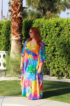 This caftan is perfect for spring and summer pool parties, Y2K-themed Bachelorette weekends, or hanging out on the couch while you watch your fave guilty pleasure show. Made from stretchy poly jersey knit fabric, you'll be comfy AND cute! GARMENT MEASUREMENTS: LENGTH: 55 inches WIDTH: 51 inches flat (102 inches around) *Pre-Order will ship by beginning of February 2025* The ONLY thing that changes is the bust so, use this chart to find your perfect fit. Measure the widest part of your bust to fi Multicolor Relaxed Fit Maxi Dress For Summer, Summer Loungewear Maxi Dress, Summer Maxi Dress For Loungewear With Short Sleeves, Summer Short Sleeve Maxi Dress For Loungewear, Summer Short Sleeve Maxi Loungewear Dress, Hippie Printed Kaftan For Summer, Multicolor Maxi Dress With Kimono Sleeves For Summer, Colorful Printed Summer Kaftan, Summer Vacation Dresses With Rainbow Print