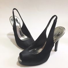 Never Worn And In Perfect Condition. Gorgeous Bcbg Max Azria Peep Toe Sling Back Pumps. Leather Silver Lining And Satin Black Outside. Heel Is Approx 4.5" With 1/2" Platform. *Smoke Free And Pet Free Home *Extremely Quick Shipping *Thank You For Your Support! Sleek Silver Evening Heels, Sleek Silver Heels For Evening, Sleek Slingback Pumps For Party, Silver Slingback Heels For Night Out, Sleek Slingback Pumps With Round Toe For Party, Sleek Silver Slingback Pumps For Formal Occasions, Elegant Silver Slingback Pumps For Night Out, Black Open Toe Slingback Pumps For Gala, Silver Fitted Slingback Pumps For Party