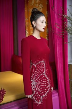 Indulge in the luxury of our Ao Dai. This exquisite piece features a sleek silhouette, long sleeves, and a gorgeous blend of velvet and satin fabrics. Elevate your style with this elegant and exclusive Ao Dai. Length: 150cm (Ao Dai), 110cm (Pants) Satin Fabrics, Mean Blvd, Satin Fabric, Floor Length, Special Features, Custom Color, Sleeve Styles, Fashion Accessories, Sleek