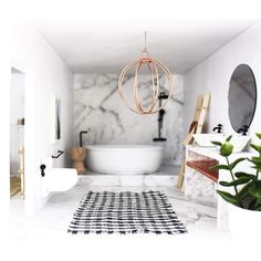 a white bathroom with black and white rugs on the floor next to a bathtub