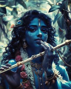 a woman dressed in blue is holding a flute